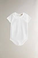 CHILDREN'S BODYSUIT WITH FLORAL EMBROIDERY