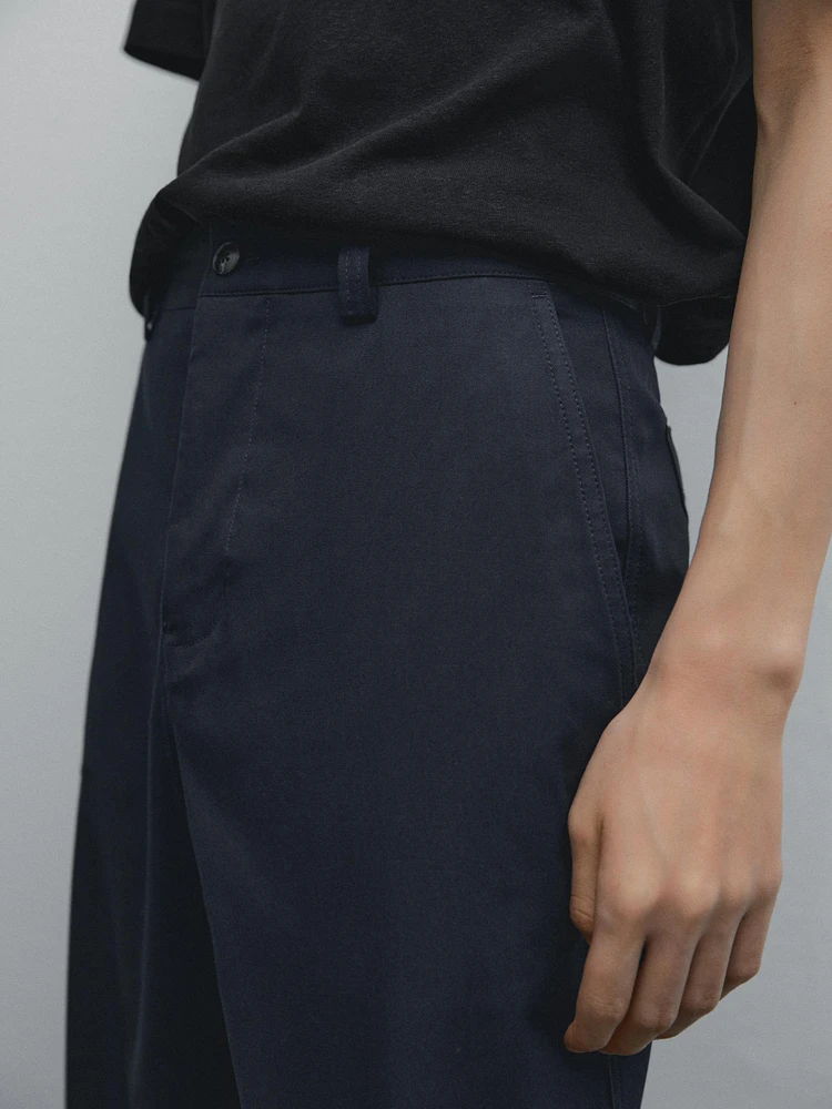 Slim fit cotton blend trousers.