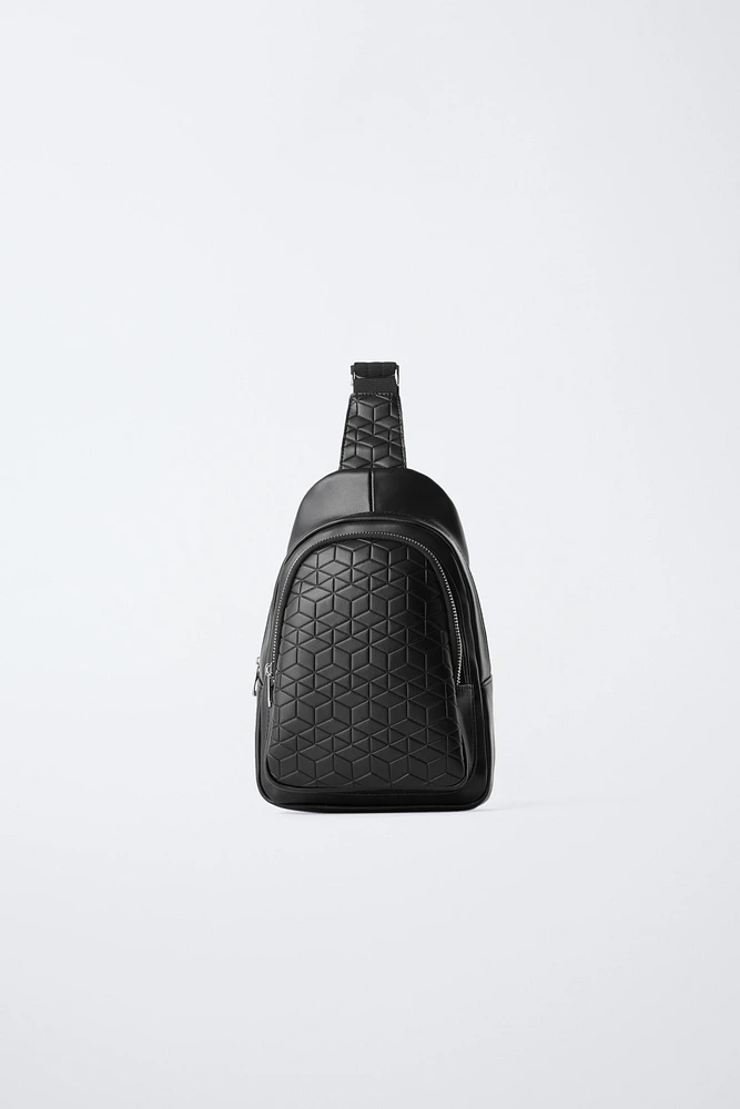 EMBOSSED CROSSBODY BACKPACK