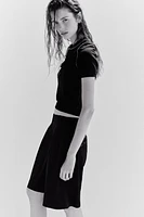 TRIMMED SHORT SLEEVE KNIT TOP