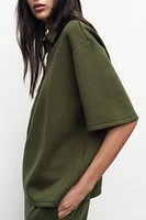 TOP À COL POLO AVEC ZIP
