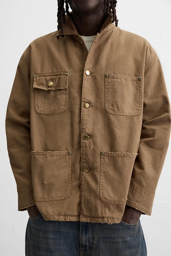 VESTE DÉLAVÉE AVEC COL EN CONTRASTE