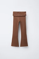 LEGGING FLARE REVERS TAILLE ŒILLETS