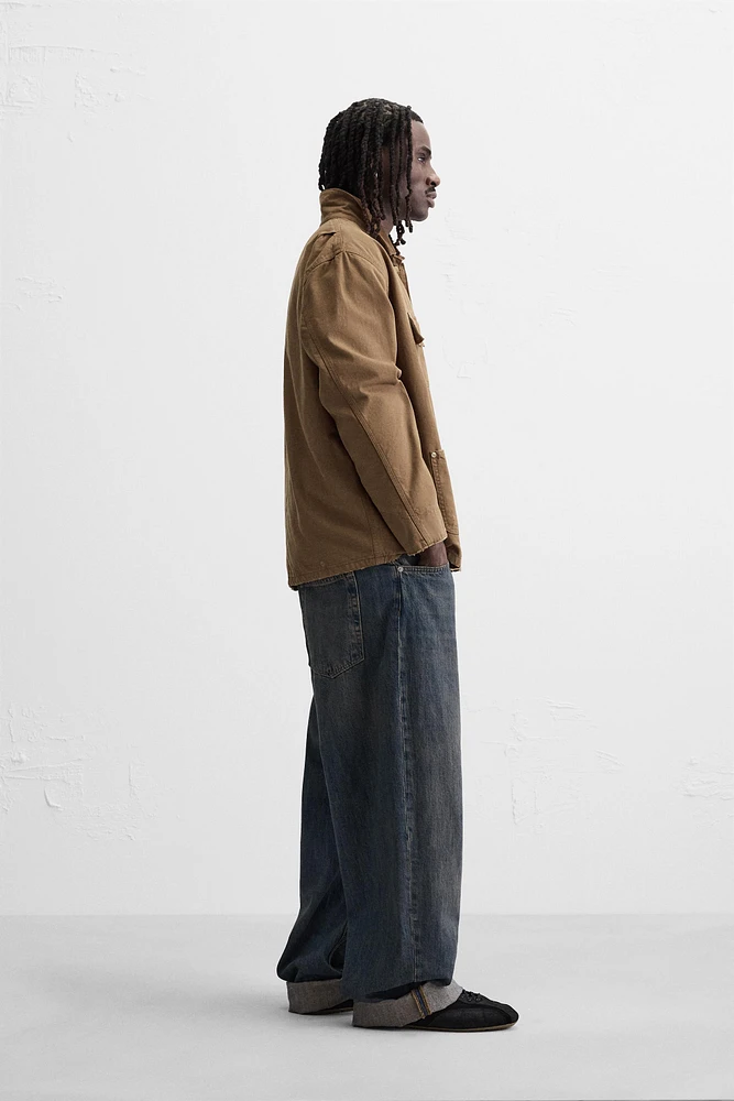 VESTE DÉLAVÉE AVEC COL EN CONTRASTE