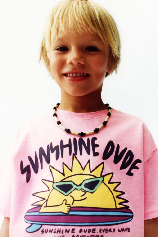 T-SHIRT TEINT EN PIÈCE IMPRIMÉ