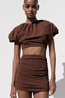 RUCHED MINI SKIRT