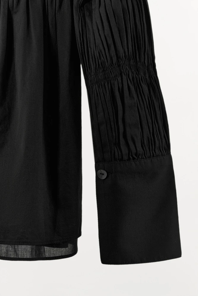 PLEATED ELASTIC BLOUSE