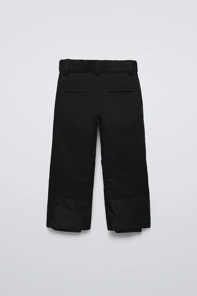 PANTALON COUPE-VENT ET DÉPERLANT RECCO® SYSTEM SKI COLLECTION