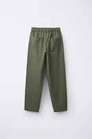 FLOWY PLEATED PANTS
