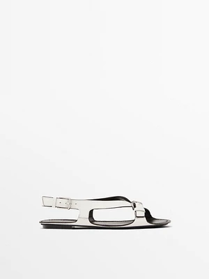 Flat leather sandals with buckles