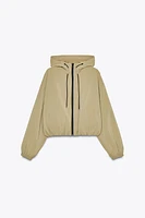 BLOUSON EFFET GOMME AVEC CAPUCHE