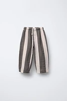 PANTALON EN MATIÈRES VARIÉES À RAYURES