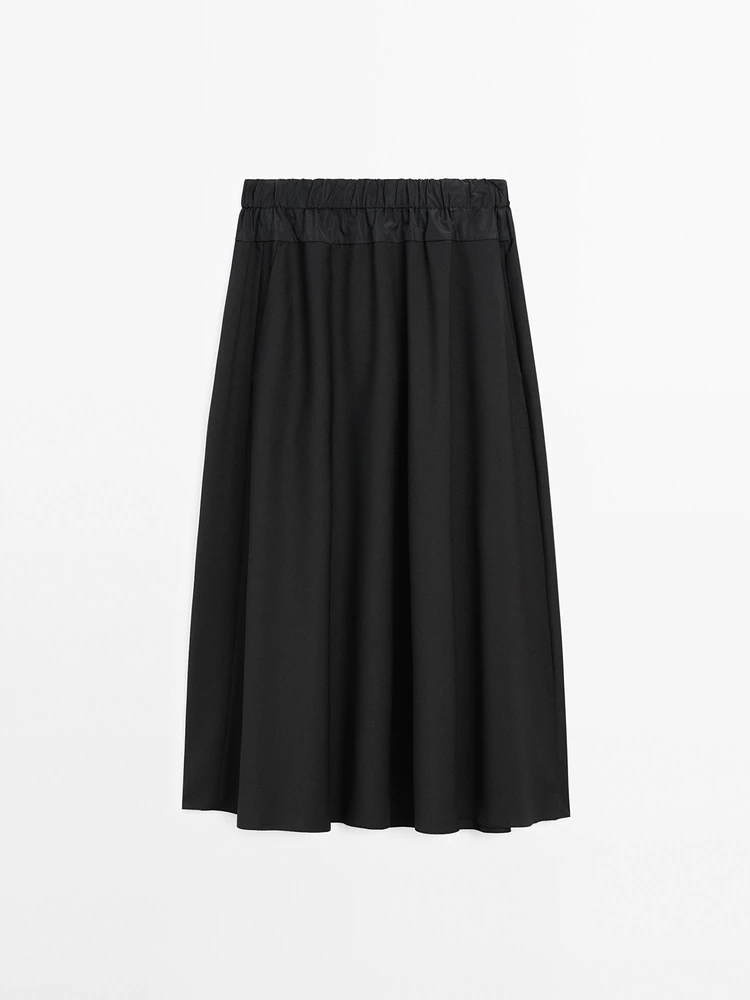 Technical fabric skirt with wool