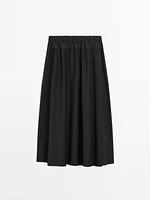 Technical fabric skirt with wool