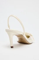 VINYL BUCKLE SLINGBACKS