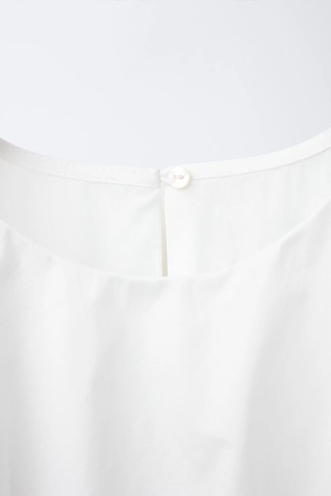 ROBE AJOURÉE À VOLANTS