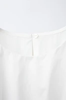 ROBE AJOURÉE À VOLANTS