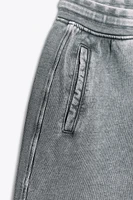 WASHED EFFECT TEXT SWEATSHORTS