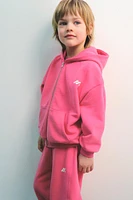 SWEAT À CAPUCHE ET LOGO