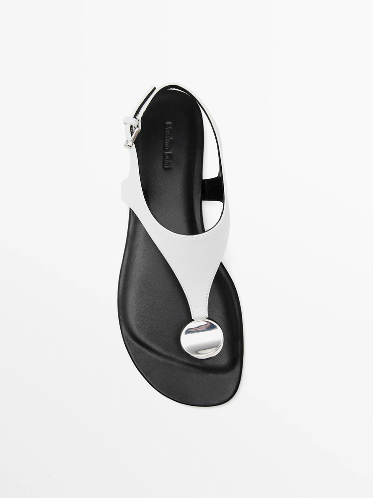 Flat leather sandals with embellished detail