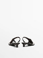 Sandales à talon asymétriques