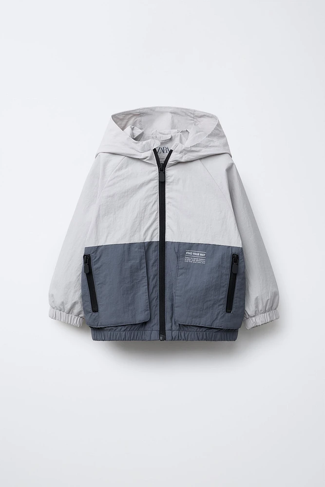 LIGHTWEIGHT HOODED RAINCOAT