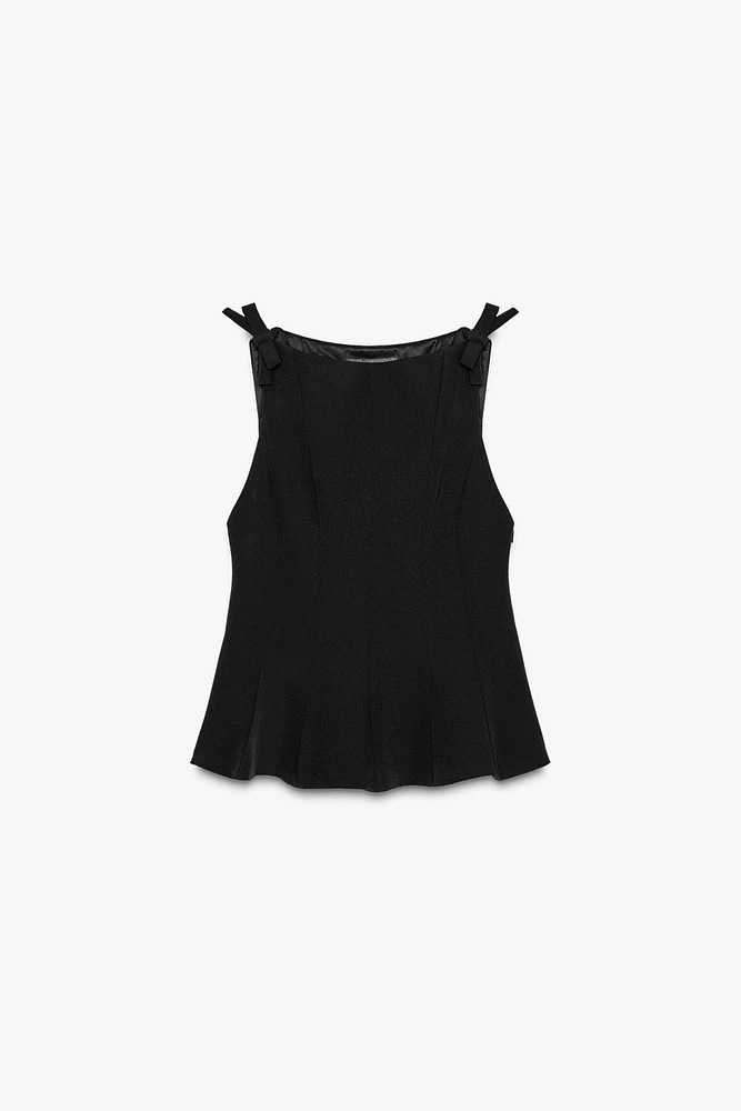 TOP PÉPLUM À LACETS