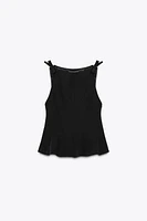 TOP PÉPLUM À LACETS