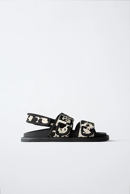 SANDALES EN CUIR ANIMAL PRINT