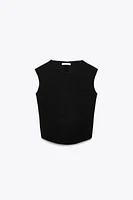 STRETCH CONTOURING BUCKLE TOP