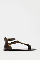 LEATHER SANDALS WITH ORNAMENT