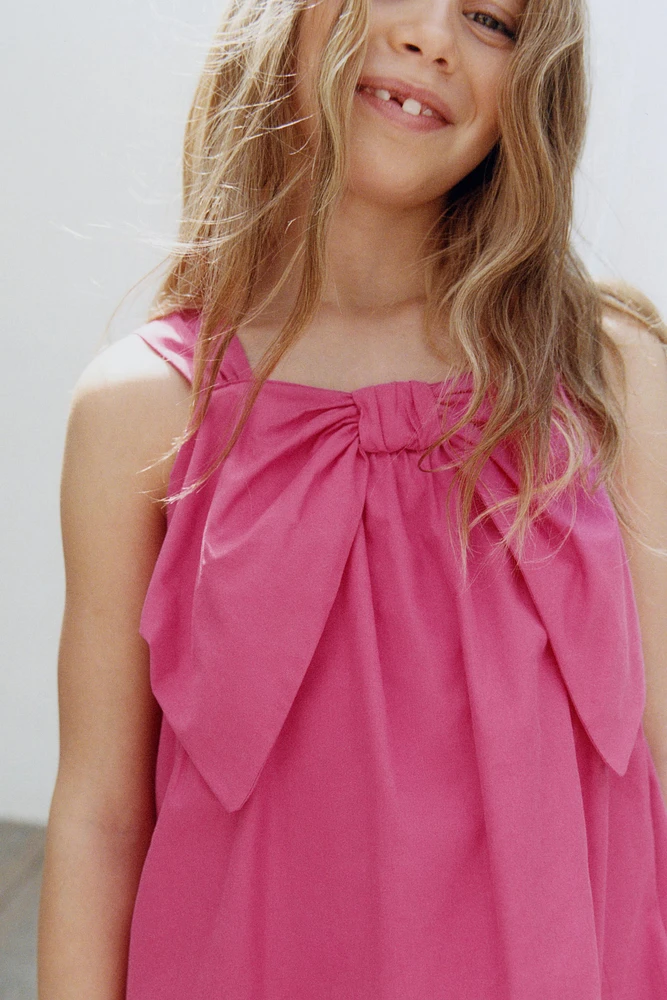 ROBE AVEC MAXI NŒUD
