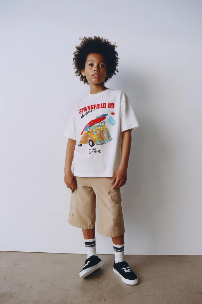 THE SIMPSONS ™ MATT GROENING CARAVAN T-SHIRT
