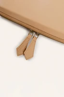TROUSSE EN CUIR