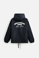 BLOUSON TECHNIQUE À CAPUCHE