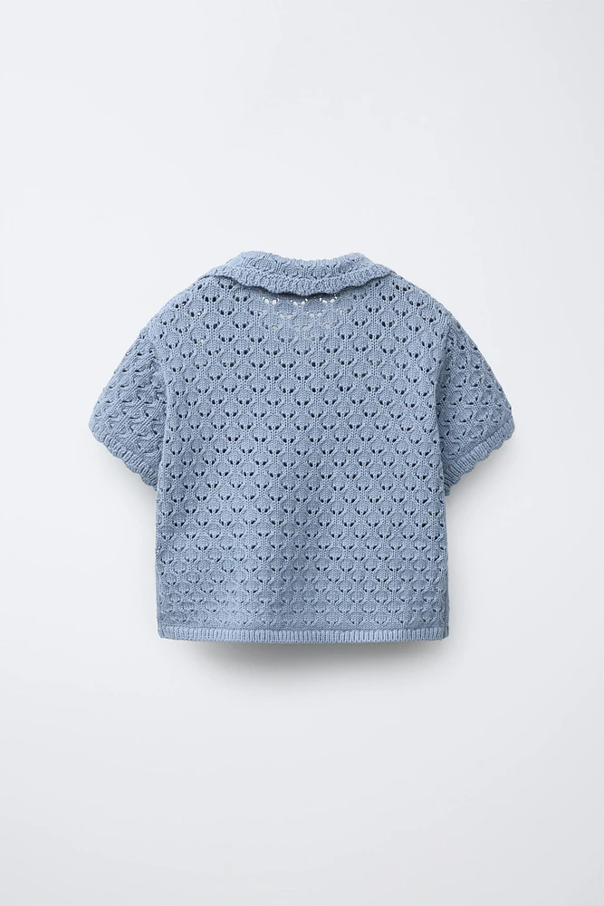 POLO EN MAILLE À FLEURS CROCHET