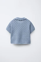 POLO EN MAILLE À FLEURS CROCHET