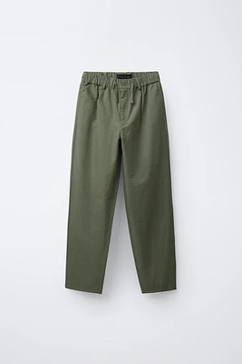 FLOWY PLEATED PANTS