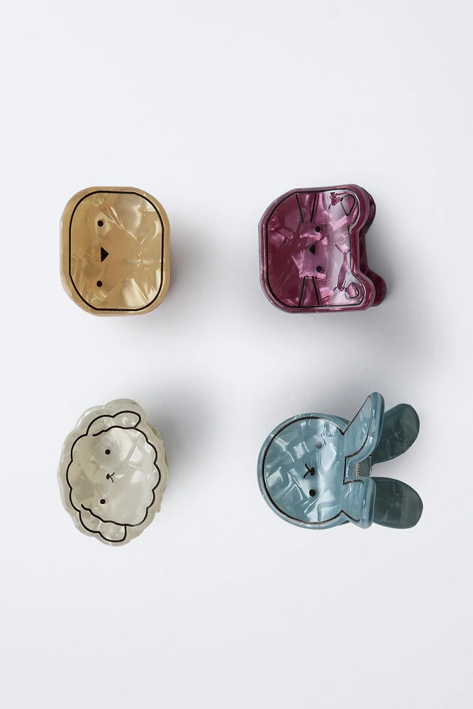 LOT DE QUATRE PINCES ANIMAUX