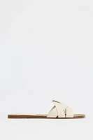 FLAT CROSSED LEATHER SANDALS