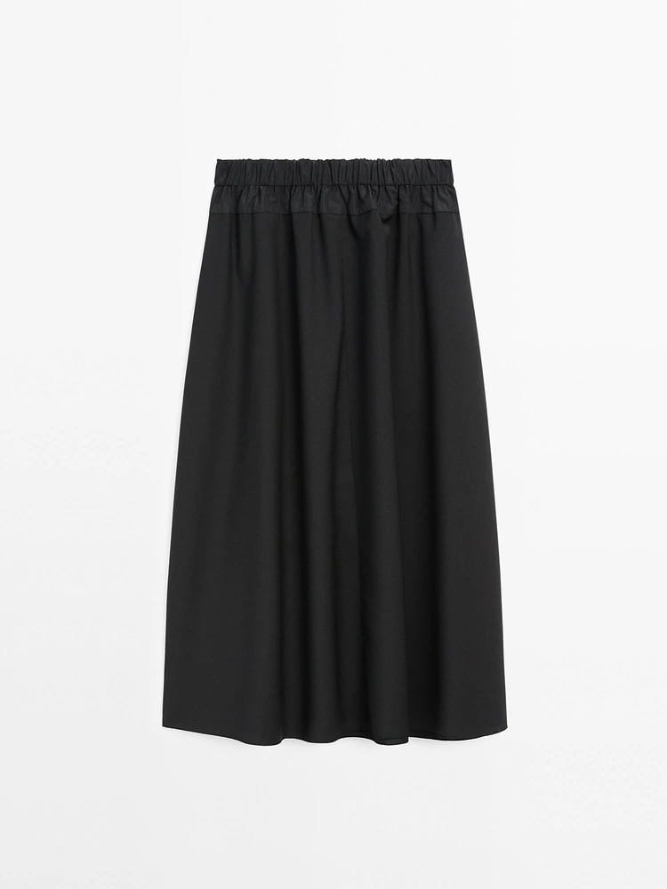 Technical fabric skirt with wool