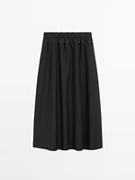 Technical fabric skirt with wool