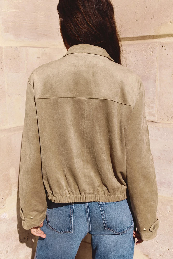 BLOUSON EN MATIÈRE SYNTHÉTIQUE