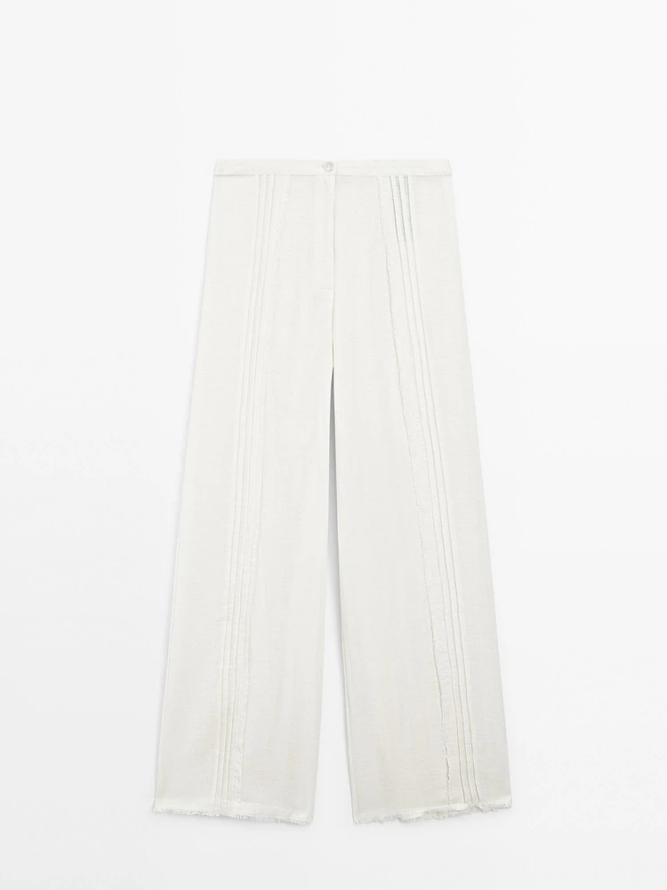 Pantalon avec broderies en coton mélangé