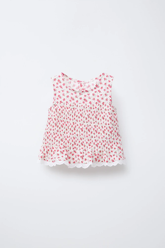 TOP PETITES FLEURS