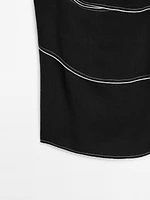 Top with contrasting topstitching
