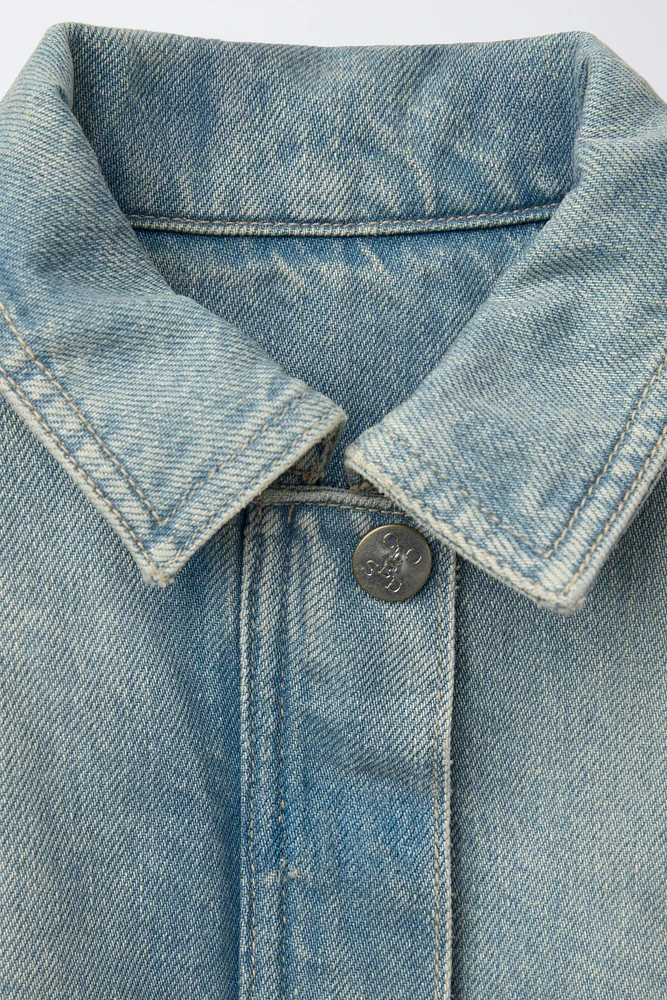 WORN EFFECT DENIM BOMBER JACKET CLOSED ©