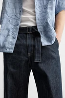 STRAIGHT FIT BELTED JEANS