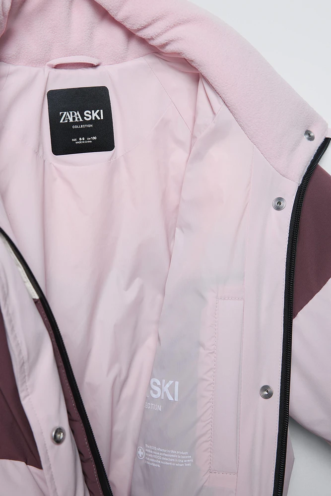 WINDPROOF AND WATER REPELLENT DOWN JUMPSUIT RECCO® SYSTEM SKI COLLECTION