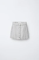CUTOUT FRAYED DENIM SKIRT
